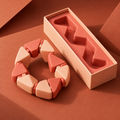 Coral Fold Hinged Geometric Loop in Peach and Coral